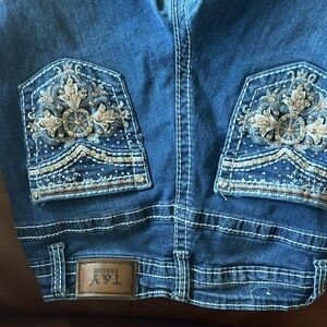 Blue Boot Cut Jeans with Contrast Stitching